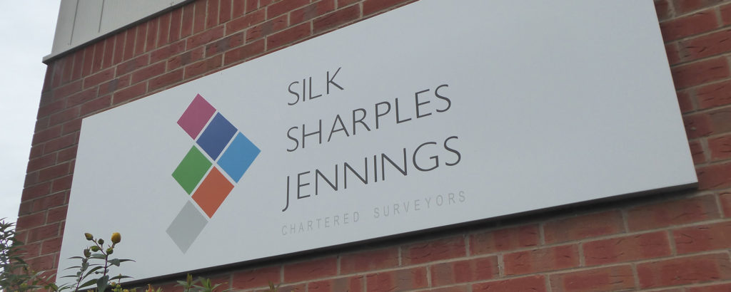 Silk Sharples Jennings Chartered Surveyors sign
